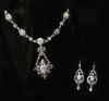 An ornate silver and paste set drop pendant necklace and pair of similar drop earrings                                                                                                                                      