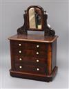 A miniature rosewood chest, with ivory handles and feet, c.1850 (dedication under drawer) height 50cm                                  