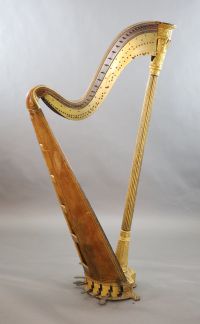 A mid 19th century J.Schwieso giltwood, satinwood and rosewood concert harp, W.2ft 9in. H.5ft 7in.                                     