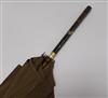 A gold-mounted and tortoiseshell handled umbrella L.92cm                                                                               