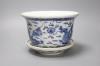 A 19th century Chinese porcelain jardiniere on stand                                                                                                                                                                        