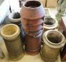 Five earthenware pottery chimney pots, largest height 92cm                                                                                                                                                                  