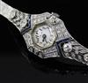 A lady's 14k white gold, sapphire and diamond set manual wind cocktail watch,                                                          