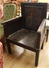 A carved oak chair                                                                                                                     