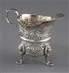 A mid 18th century Irish silver tripod milk jug, by William Townsend? 6 0z.                                                            