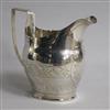 A George III engraved silver helmet shaped cream jug, 3 oz.                                                                            