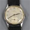 A gentleman's late 1940's stainless steel Omega manual wind wrist watch, movement c. 30T2 PC, on later associated strap.               