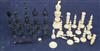 A 19th century Indian stained and natural ivory part chess set                                                                         