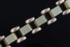 A stylish mid 20th century Hungarian two colour 14ct gold domed and brick link bracelet, 18.5cm.                                       