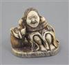 A Japanese ivory netsuke of Shojo, Meiji period, signed Ryumin, h. 3.3cm                                                               