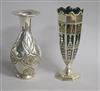 An Edwardian pierced silver spill vase, Goldsmiths & Silversmiths Co Ltd, London, 1909, 15.7cm & one other vase.                       