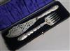 A cased pair of Victorian silver fish servers, Henry Howson, Sheffield, 1861, knife 32.5cm.                                            