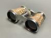 A cased pair of mother of pearl opera glasses, 6cm                                                                                                                                                                          