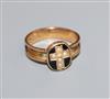 A late Victorian 18ct gold, seed pearl and black enamel mourning ring, size K.                                                         