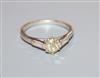 A modern 18ct white gold and fancy yellow single stone diamond ring, with baguette cut diamond set shoulders, size Q.                  