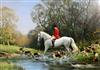 § Frank Wootton (1911-1996) Huntsman and hounds crossing a stream 28 x 40in.                                                           