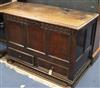 A mid 18th century panelled oak mule chest, monogrammed E.H. W.109cm                                                                   