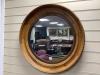 A 19th century circular pine framed mirror, diameter 68cm                                                                                                                                                                   