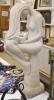 A faux marble figure of a seated nude, on plinth, height 81cm                                                                                                                                                               