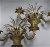 A pair of wall sconces designed as baskets of flowers                                                                                  