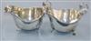 A pair of George V silver sauce boats, Walker & Hall, Sheffield, 1923, 9.5 oz.                                                         