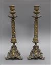 A pair of Renaissance style cast brass candlesticks height 41cm                                                                        