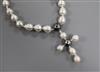 A baroque pearl cross pendant necklace, with white and yellow metal clasp, pendant 7.4mm.                                              