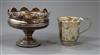 A George V silver pedestal bowl and a silver christening mug, 6 oz.                                                                    