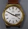 A gentleman's steel and gold plated Omega automatic day/date wrist watch,                                                              