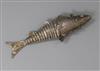 An engraved white metal articulated fish with hinged lid, 12cm.                                                                        