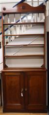 A Victorian mahogany cupboard with associated plate rack W.102cm                                                                       