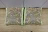 A pair of large fabric cushions                                                                                                                                                                                             