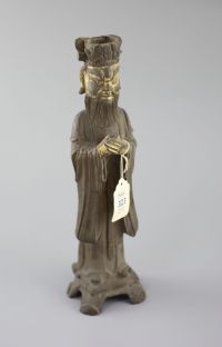 A Chinese bronze standing figure of an Emperor, late Ming dynasty, 30cm high, losses, Provenance - A. T. Arber-Cooke                   