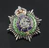 An 18ct gold, diamond and three colour enamel Army Service Corps sweethearts brooch, 33mm.                                             