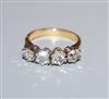 A continental 750 yellow metal and rose cut diamond set four stone half hoop ring, size K.                                             