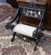 An Italian 19th century carved bone inlaid ebonised elbow chair                                                                        