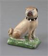 A Derby figure of a seated pug, c.1758, h. 8.1cm, tail restored                                                                        