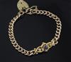 An early 20th century gold, sapphire and diamond set curb link bracelet,                                                               