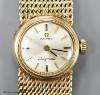 A lady's 9ct gold Omega Ladymatic wrist watch on integral 9ct gold Omega bracelet                                                                                                                                           