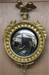 A Regency gilt carved wood convex wall mirror W.52cm                                                                                   