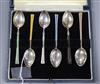 A cased set of 1950's silver and enamel coffee spoons.                                                                                 