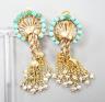 A pair of 20th century Middle Eastern yellow metal, seed pearl and turquoise set tassel drop ear clips, 47mm, gross weight 12.5 grams.                                                                                      