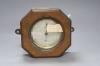 An Edwardian oak cased travelling aneroid barometer, height 19cm                                                                                                                                                            