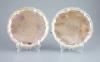 A pair of early George III silver salvers by Richard Rugg,                                                                                                                                                                  