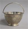A Victorian silver sugar basket, by Thomas Bradbury & Sons, London, 1868, 7.5 oz.                                                      