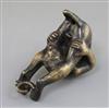 A 19th century bronze oil lamp in the form of an acrobat after Riccio, 5.5in.                                                          