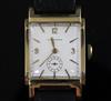 A gentleman's stylish 1930's? 14k gold Longines manual wind wrist watch,                                                               