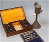 A card box, drawing instruments and a brass coffee pot                                                                                 