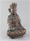 A Chinese lacquered bronze seated figure of Guanyin, possibly Ming dynasty, H. 31cm                                                    