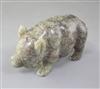 A Chinese celadon and brown jade figure of a pig, standing on all fours, length 10.7cm                                                 